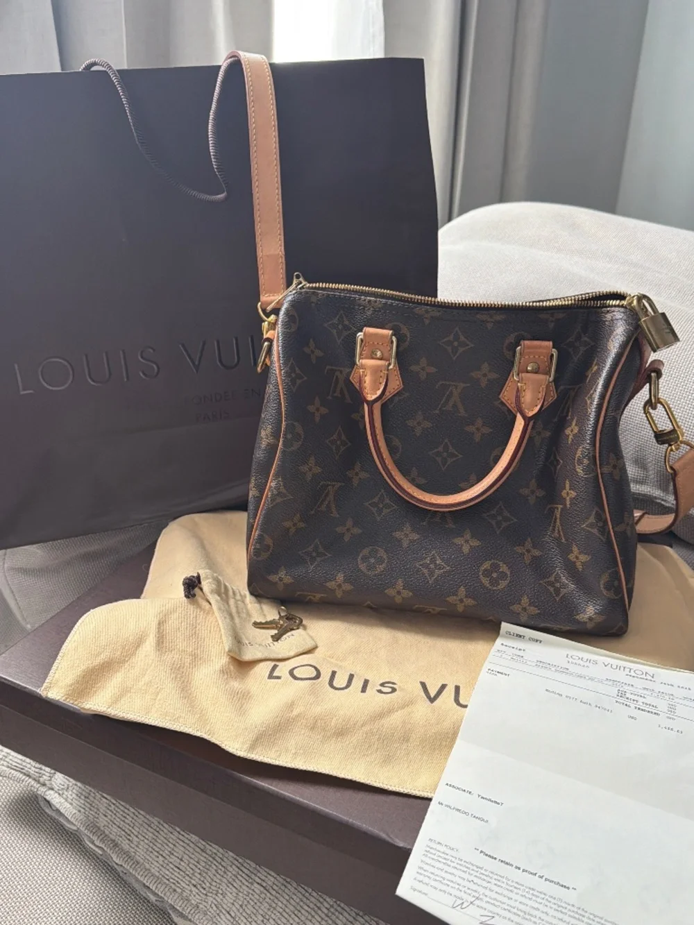 Pre-owned authentic Louis Vuitton speedy bandoulière NM 25